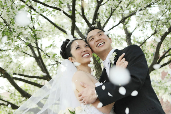 outdoor portrait of laughing bride and groom - photo by Kenny Kim Photography